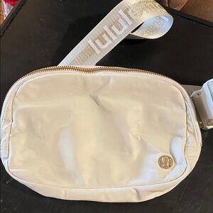 lululemon athletica light grey with gold and silver accents Crossbody Bag